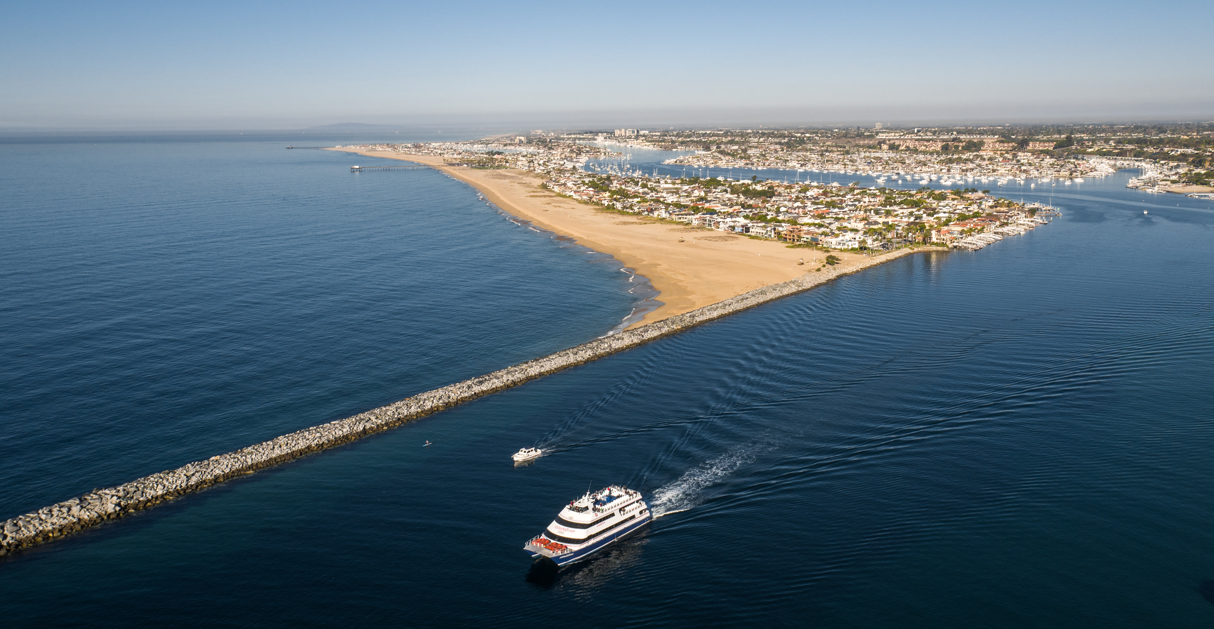 Boat leaving the Newport Harbor